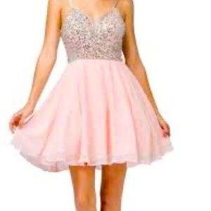 Perfect Grad/Prom or Special Occasion Dress. Never been worn. Tags on